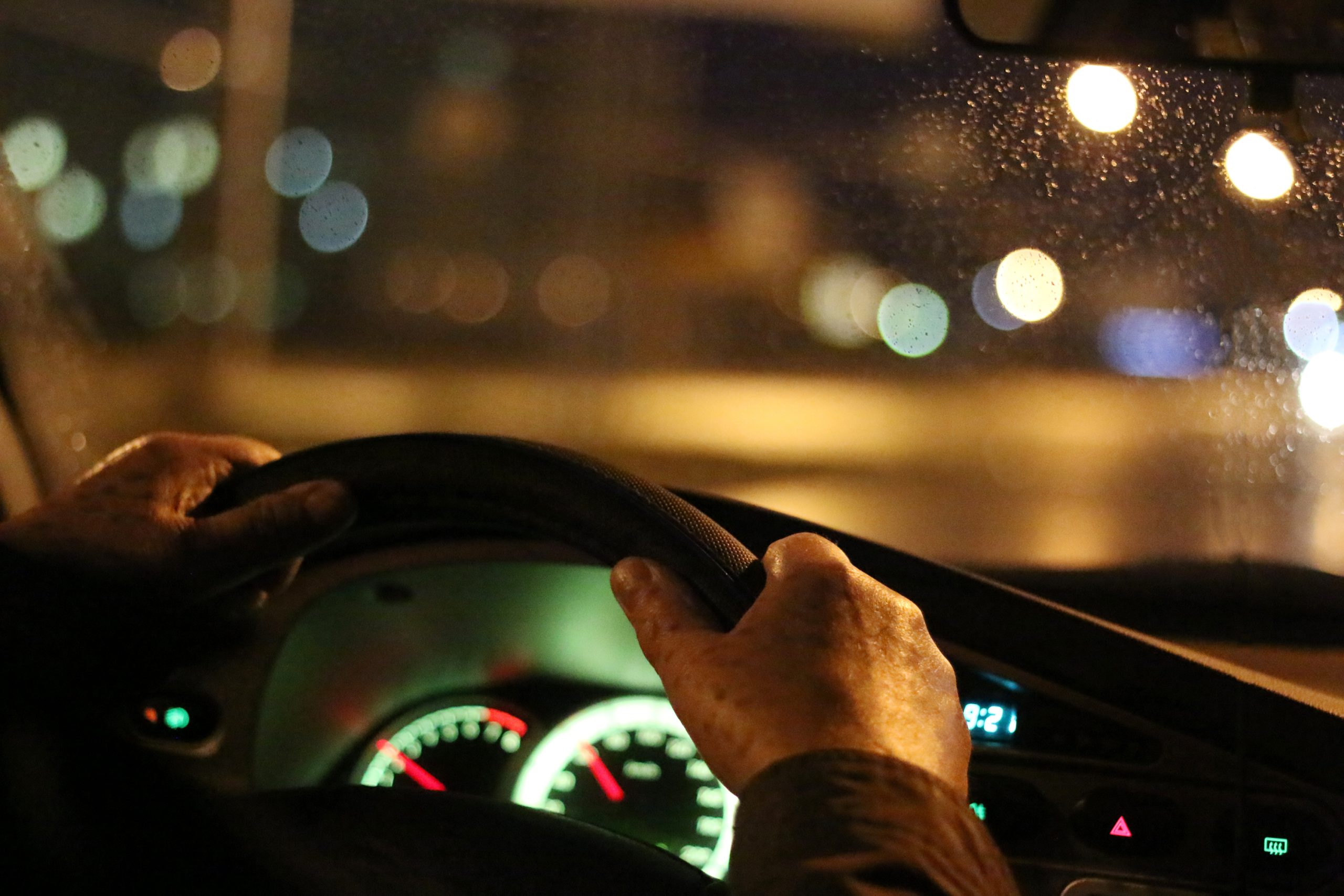 old man driving hard to see at night eye conditions night blindness